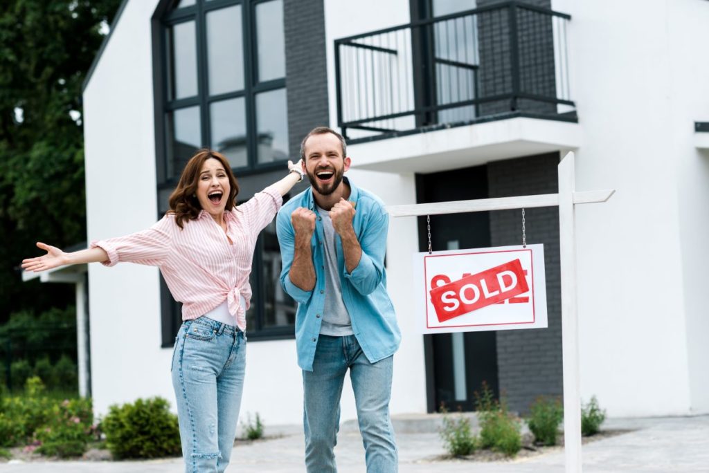 happy couple who just sold their house