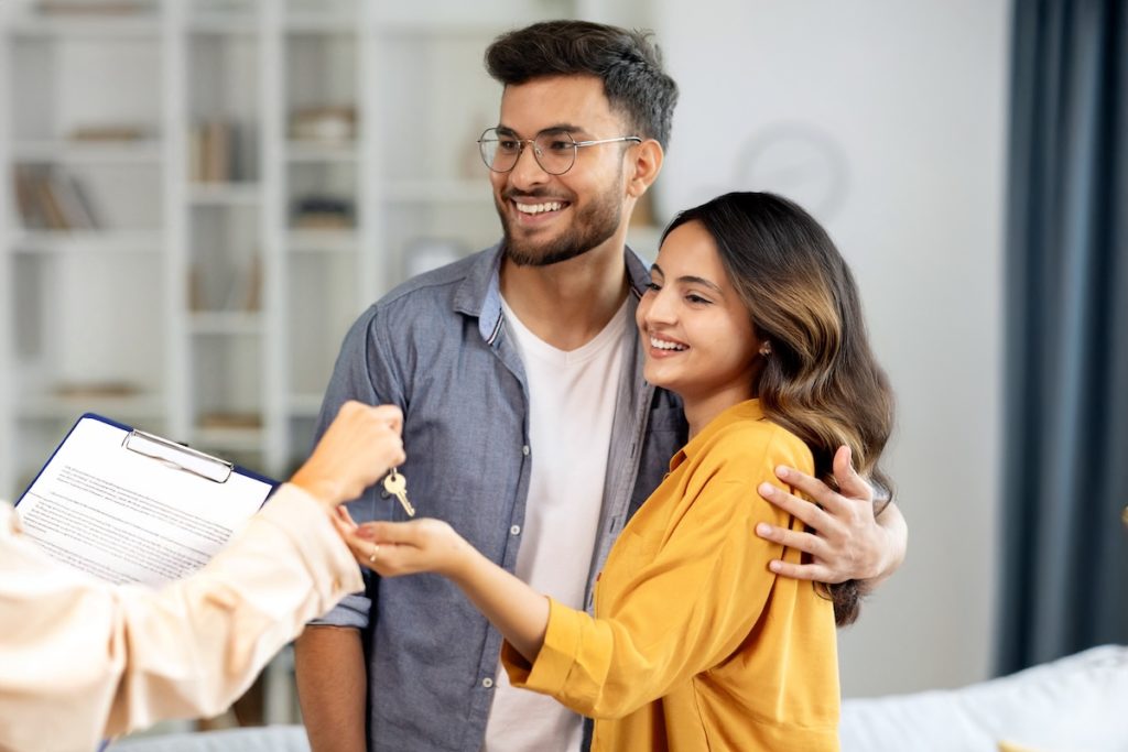 young couple buying home with buyer's agent